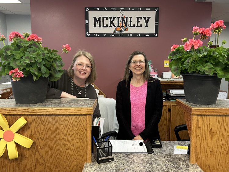 Two office staff