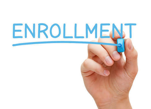 Enrollment written in blue marker
