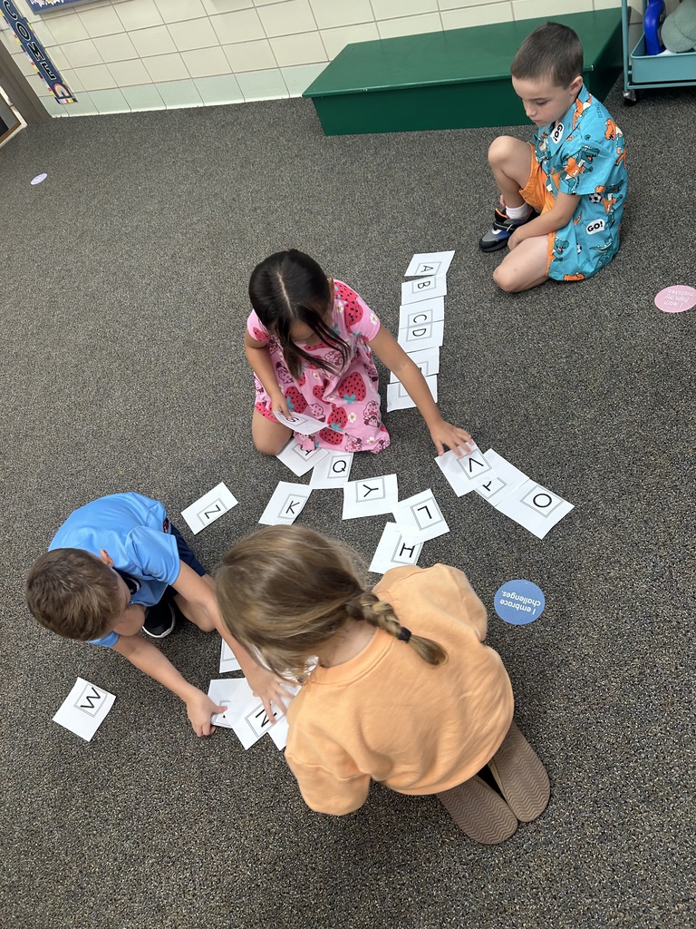 Mrs. Haslouer's class assembling the alphabet.