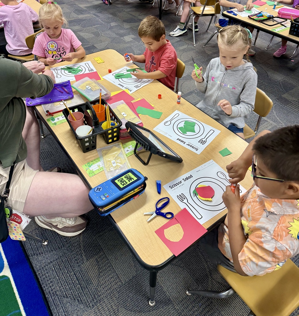 Mrs. Todd's students practicing their cutting skills.