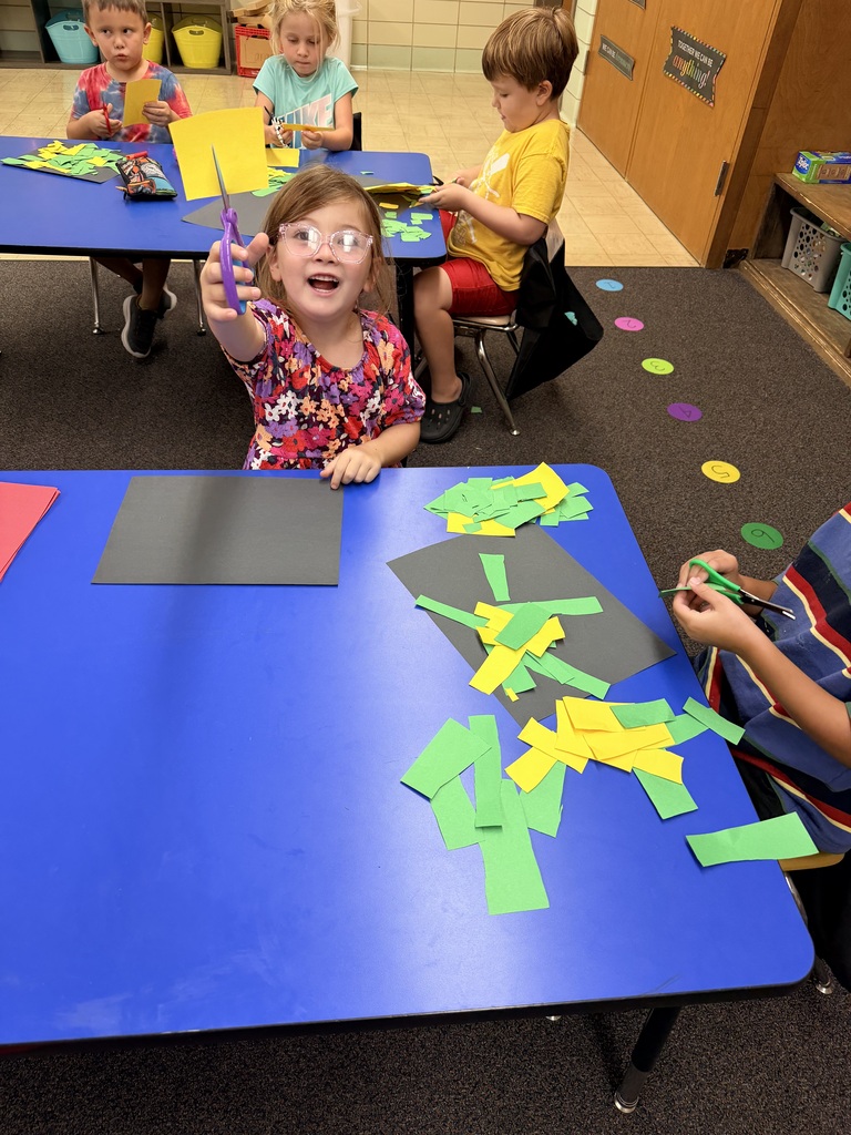 Mrs. McKnight's classroom practicing cutting.