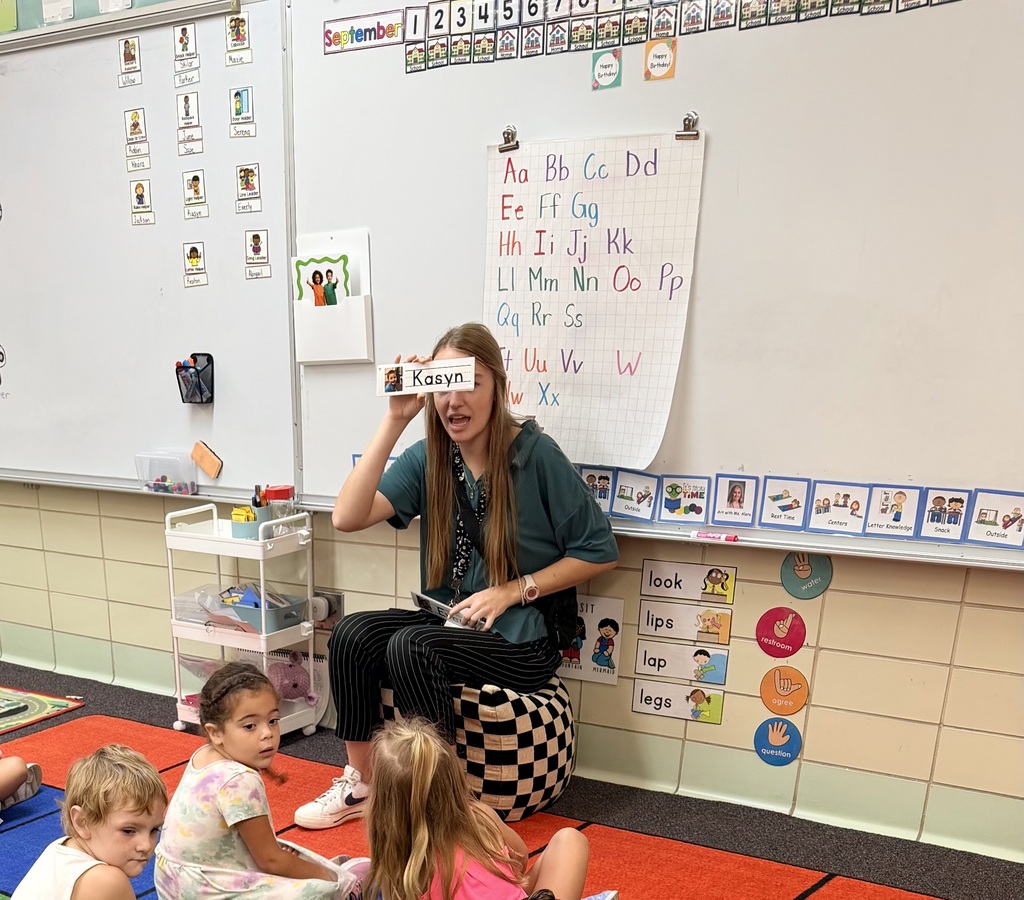 Ms. Bathurst's class starting their day with recognizing names and morning greeting.