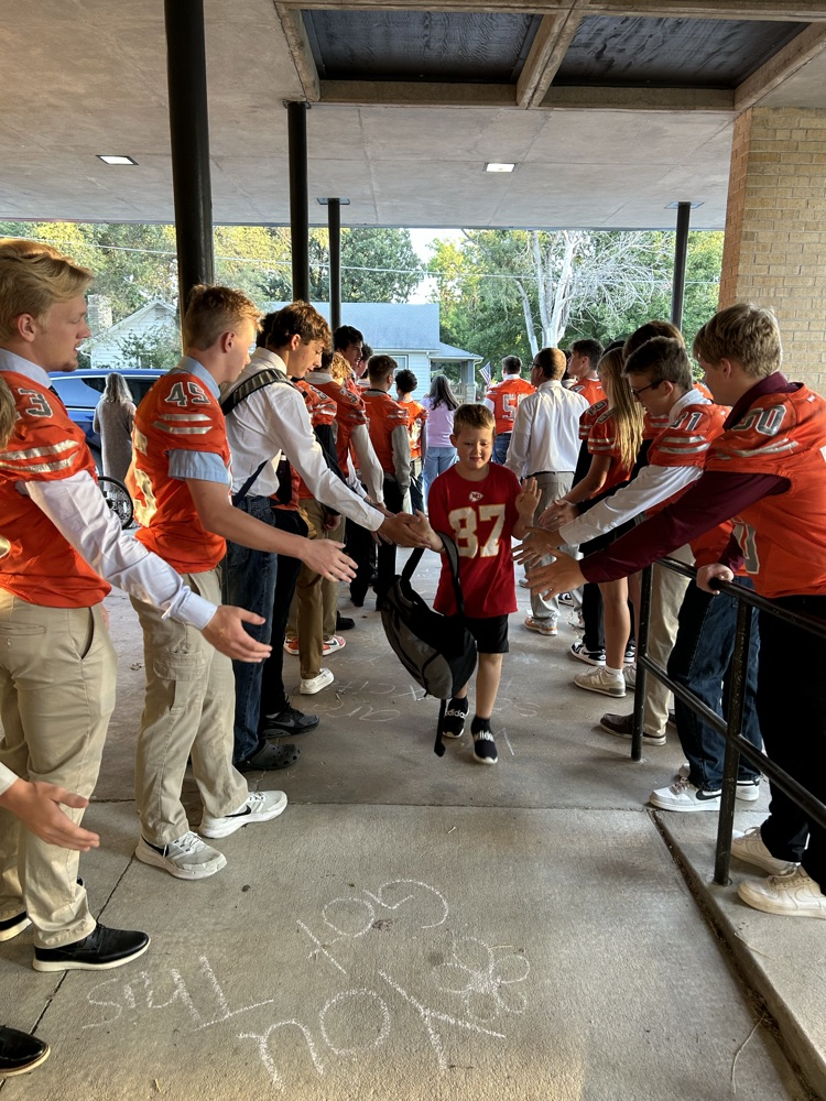 football player high 5’s