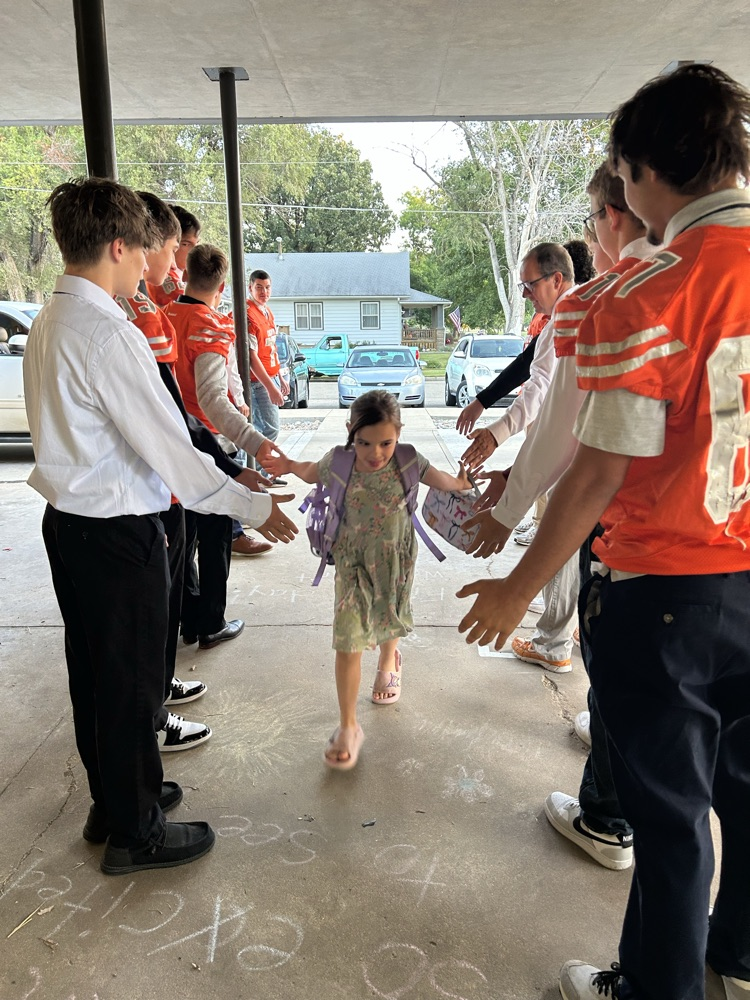 football player high 5’s