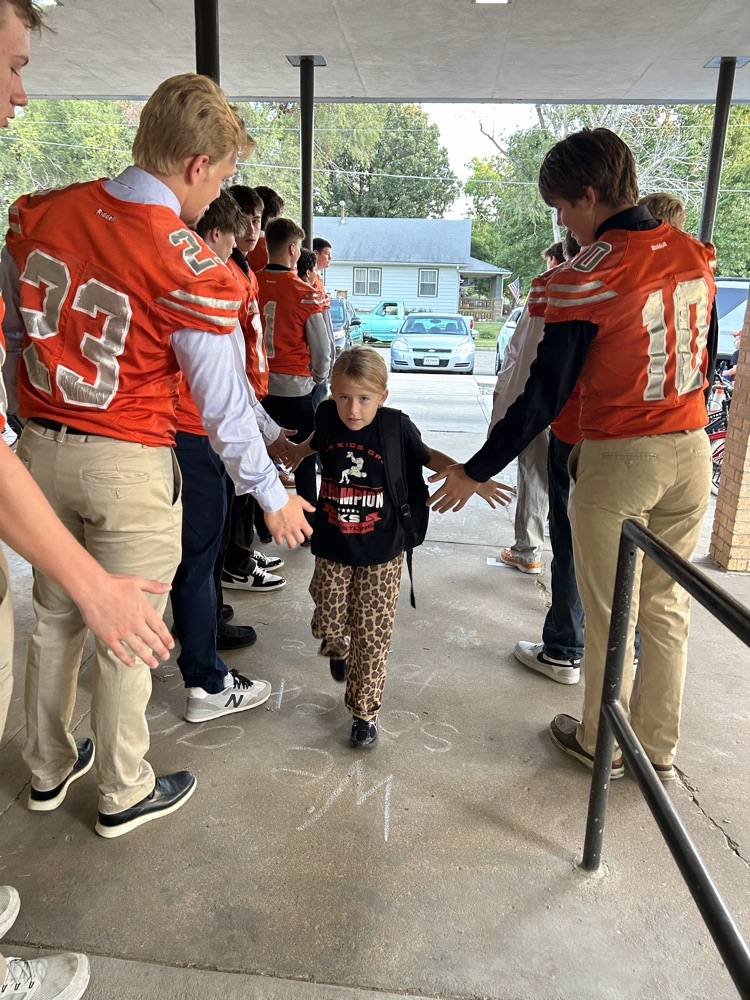 football player high 5’s