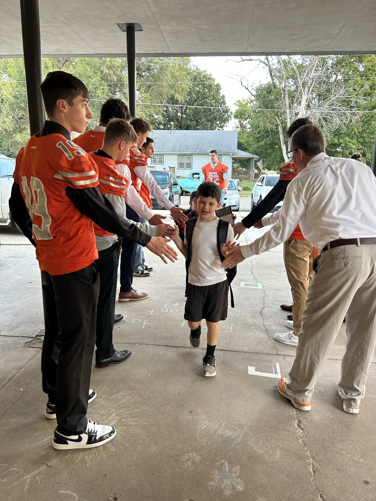 football player high 5’s