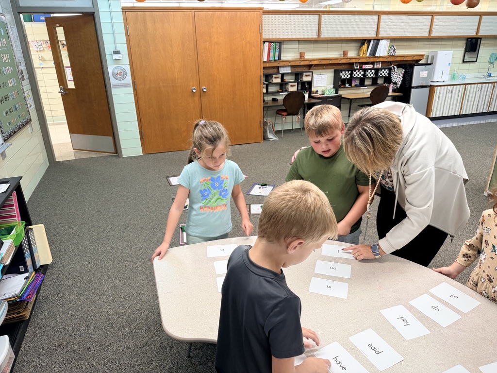 Mrs. Hoover playing a high frequency word game with students.