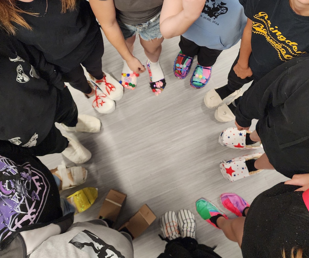 8th Grade STEAM created fancy shoes from consumable materials.