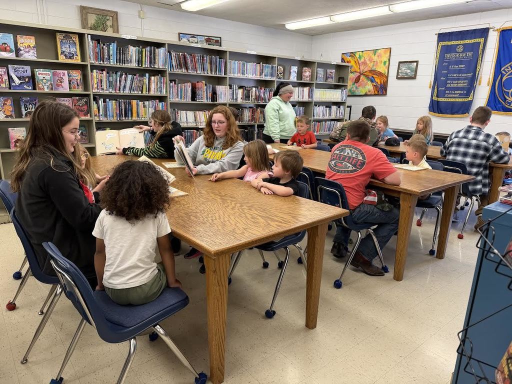 Interactors reading to the Preschoolers