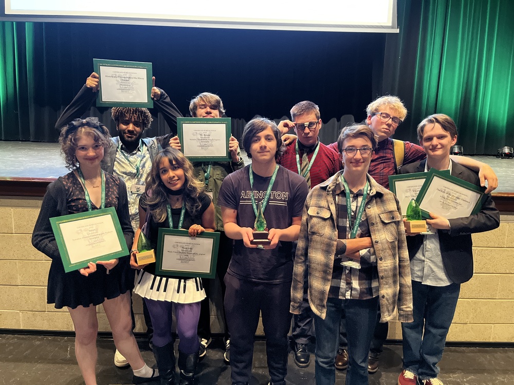 ASHS Students holding their awards at the Film Festival