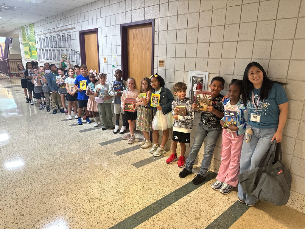 Students line up with books at Copper Beech