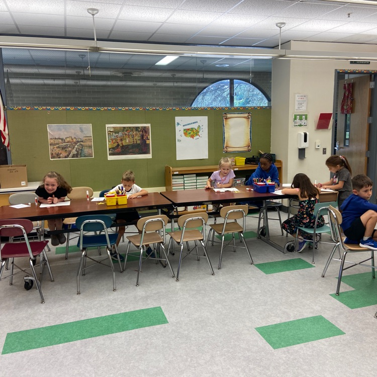 students making cards at tables