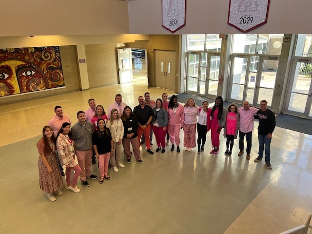 AMS staff wearing their pink