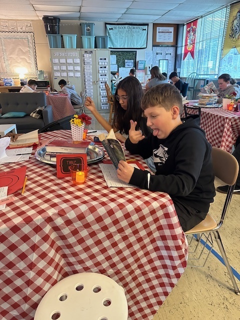 Students sampling books in class at the Book Tasting