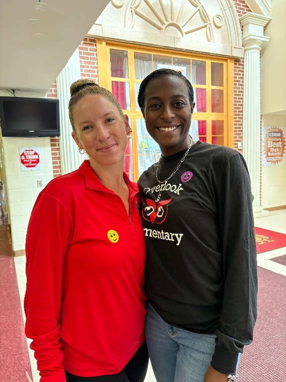 2 Overlook teachers pose together during Start With Hello Week