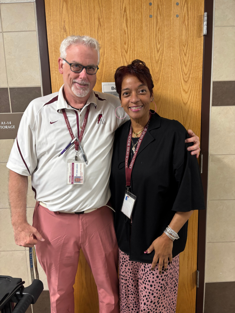 Mr. Lodewick and Dr. Swift in their pink pants
