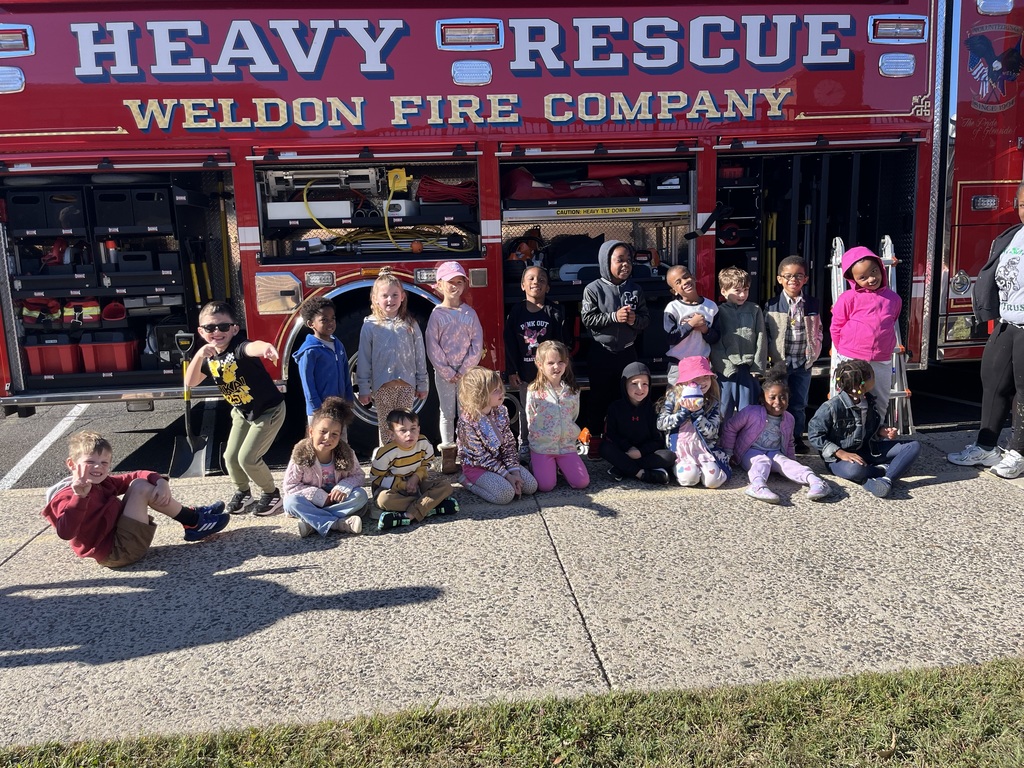 students in front of the fire truck