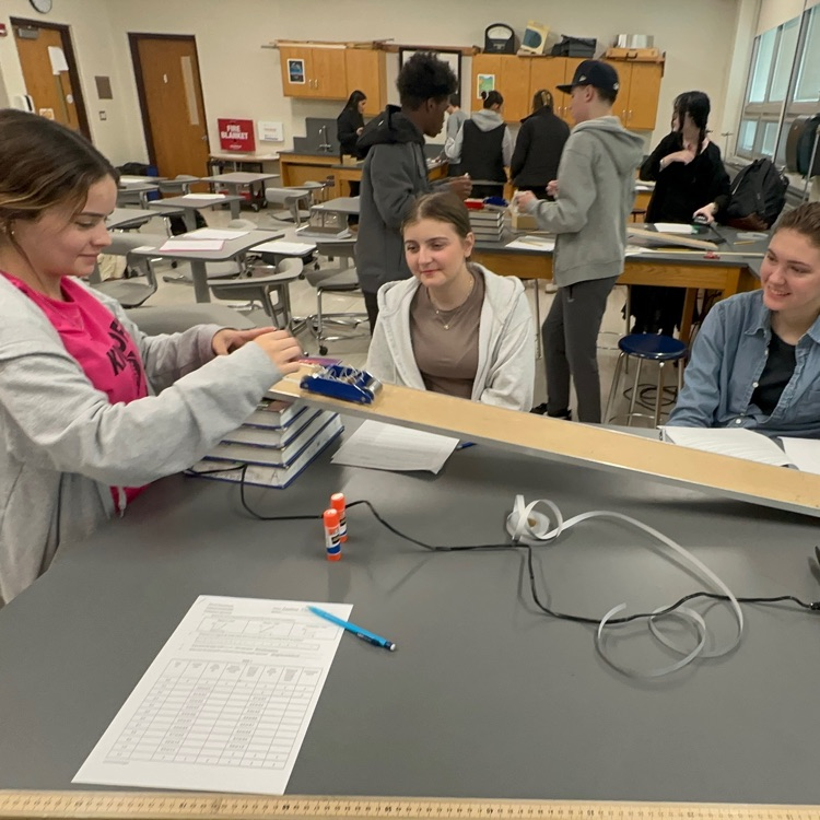 Students conducting acceleration experiments