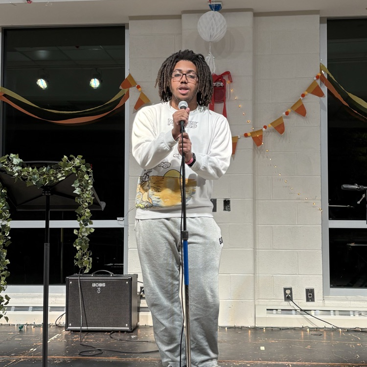 students performing at coffee house.