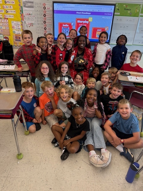 students smiling in class