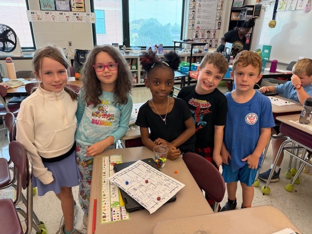 students smiling in class