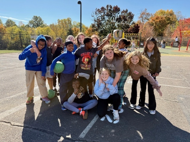 students outside smiling