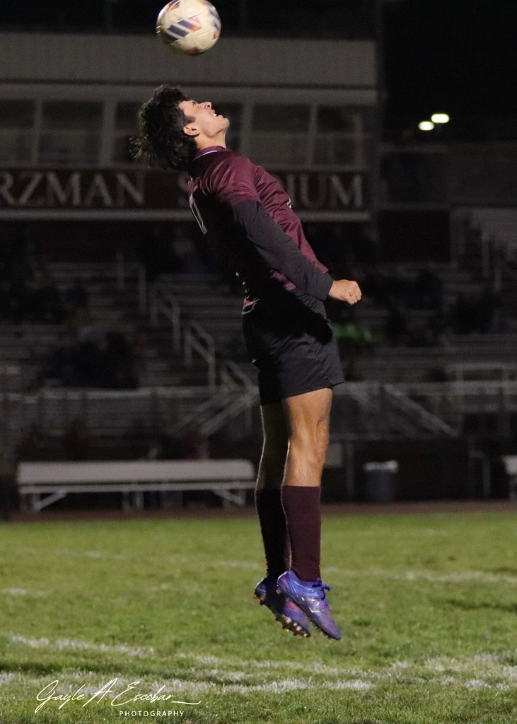 heading a ball soccer team