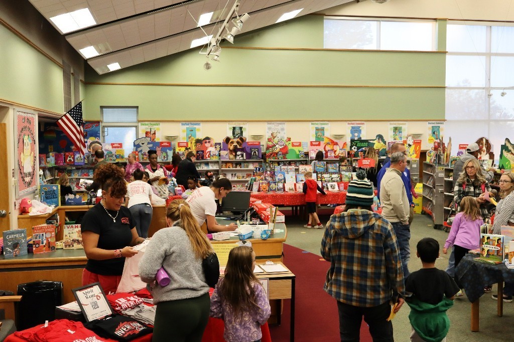 Families gather in Overlook Elementary library for Reading Night