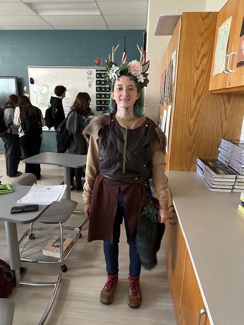 girl dressed like a forest warrior