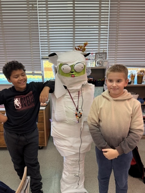 Image of 6th grade students participating in mummy math