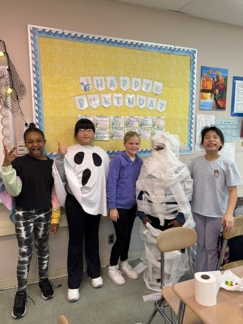Image of 6th grade students participating in mummy math