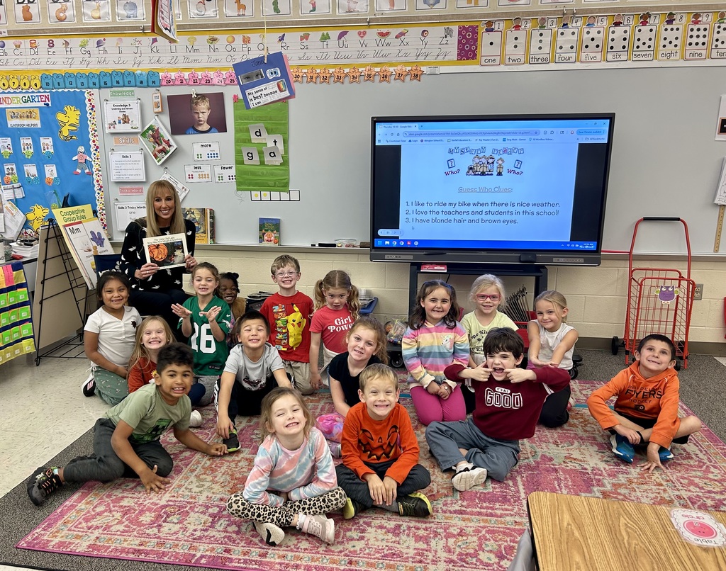 Ms. Stokes reading to a kindergarten class