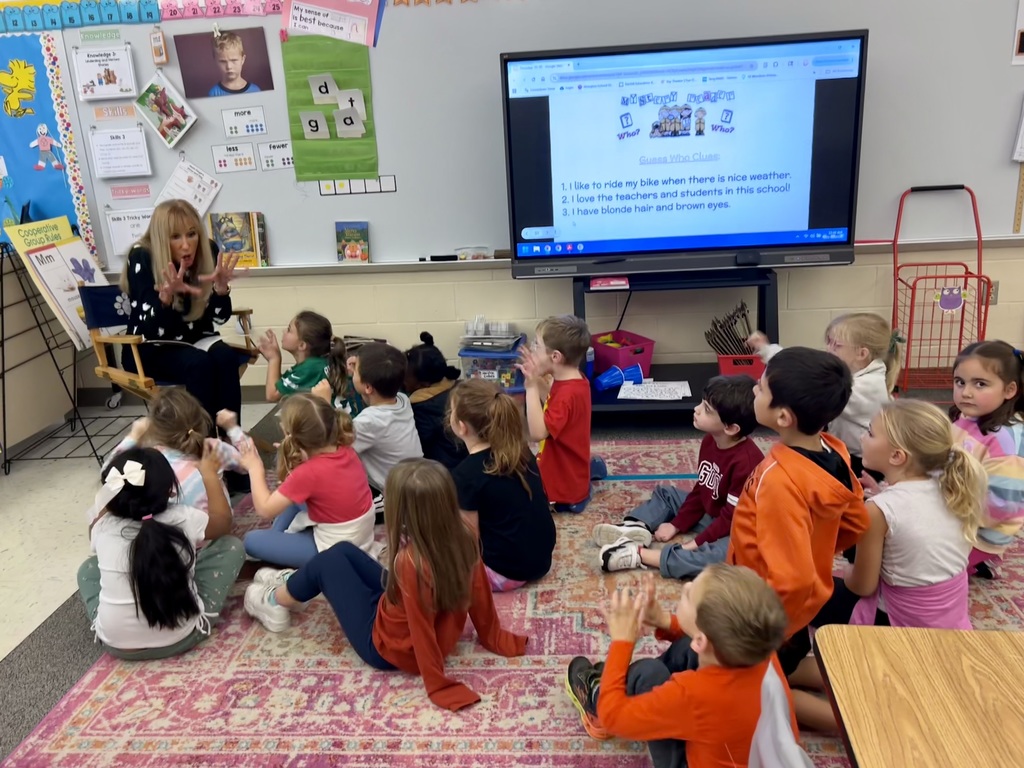 Ms. Stokes reading to a kindergarten class