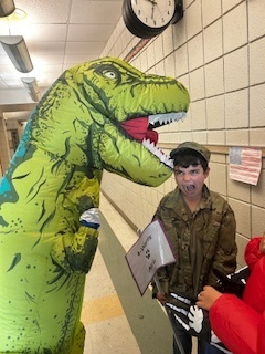students smiling in their Halloween costumes