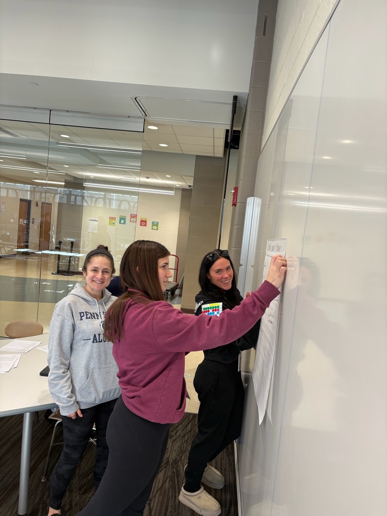 Senior High staff discuss Portrait of a Graduate