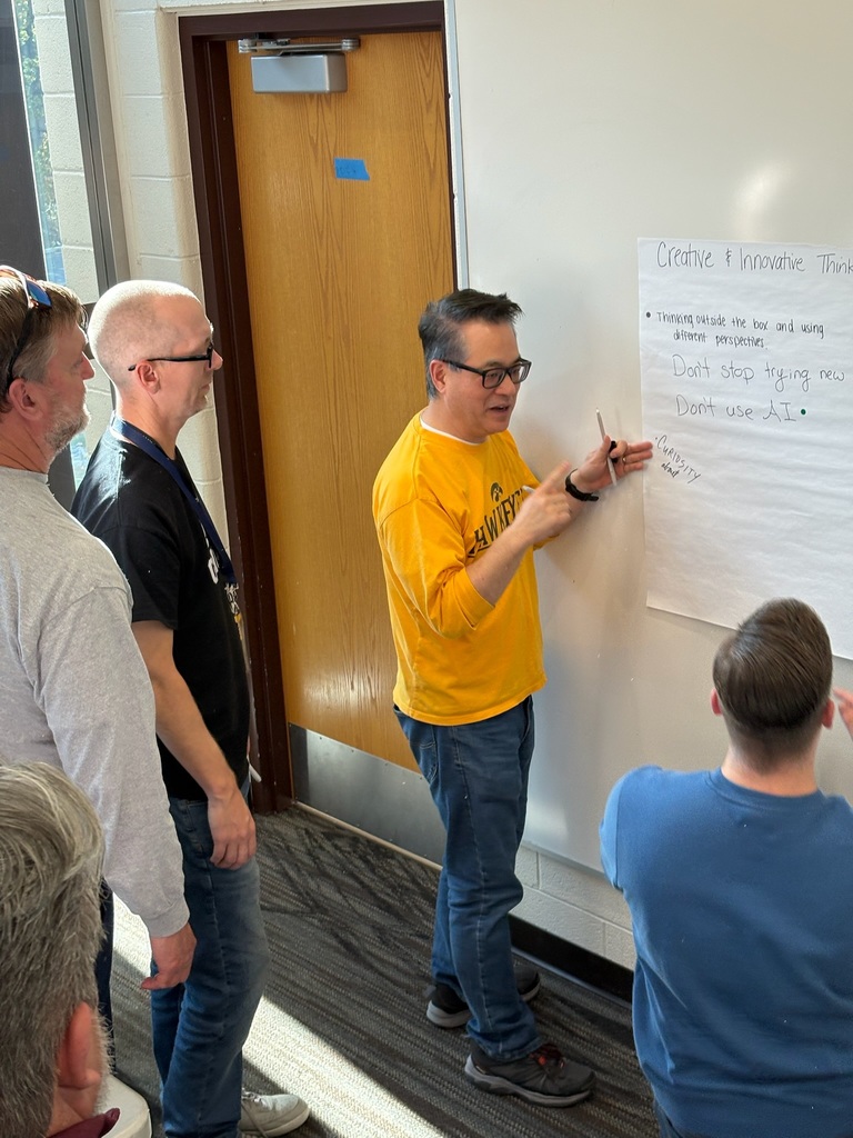 Senior High staff discuss Portrait of a Graduate