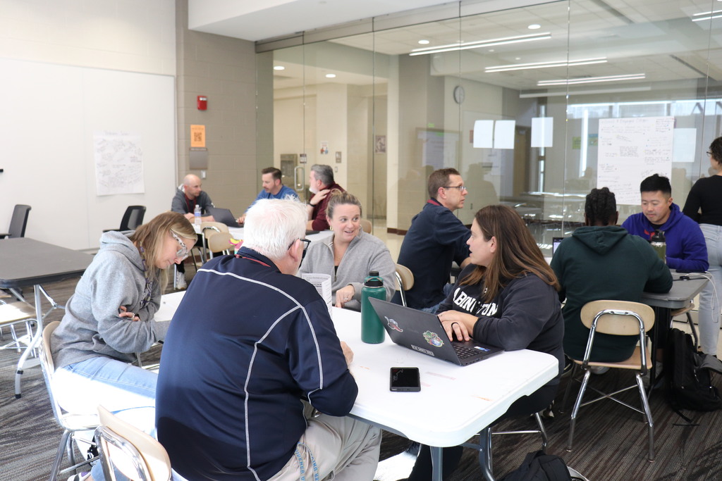 Senior High staff discuss Portrait of a Graduate