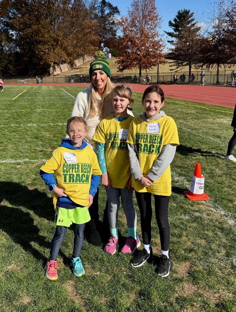 students and Ms. Stokes smiling