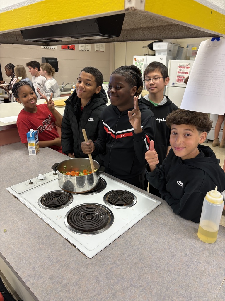 Image of 7th grade students practicing their knife skills