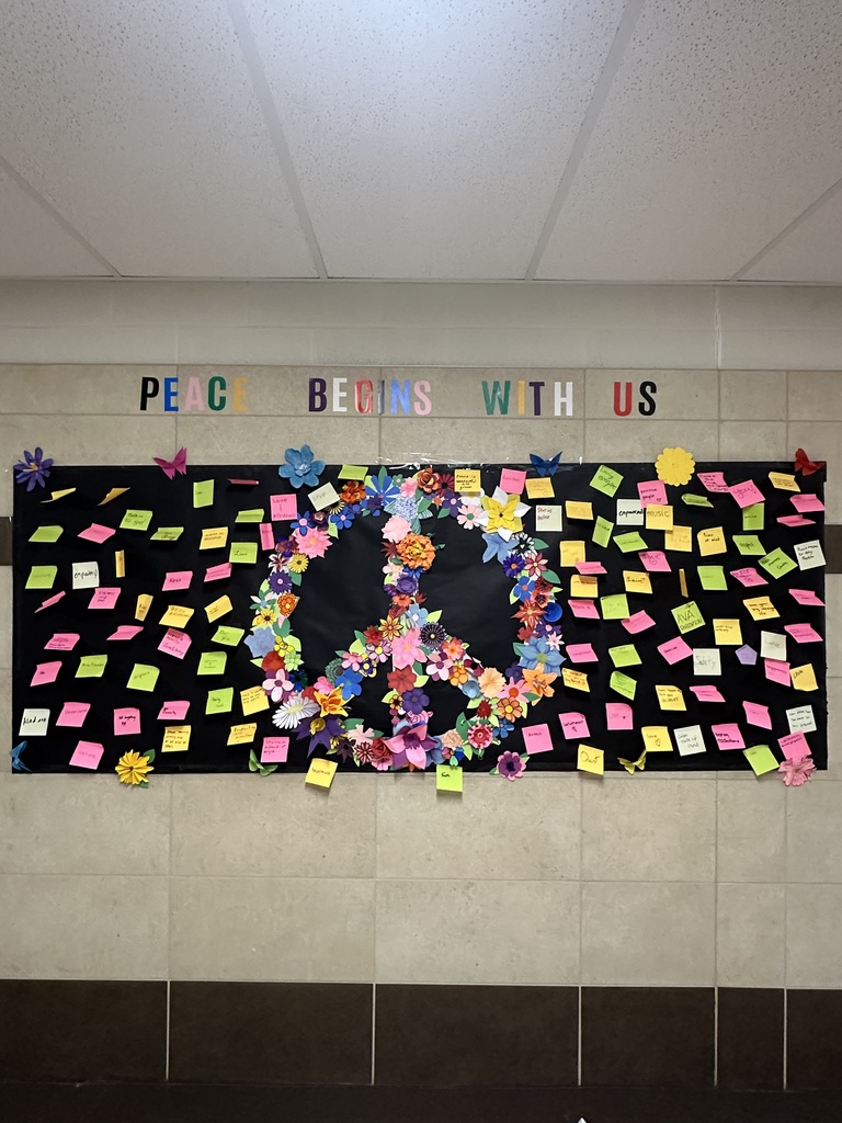 Peace begins with us poster with flowers, stickers and peace sign. 