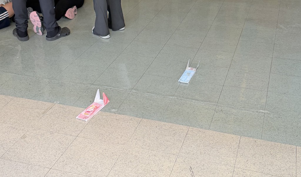 Image of middle school students competing in STEM activity. 