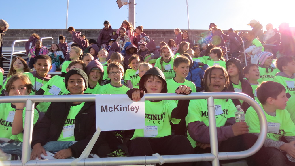 Students cheering on their teammates
