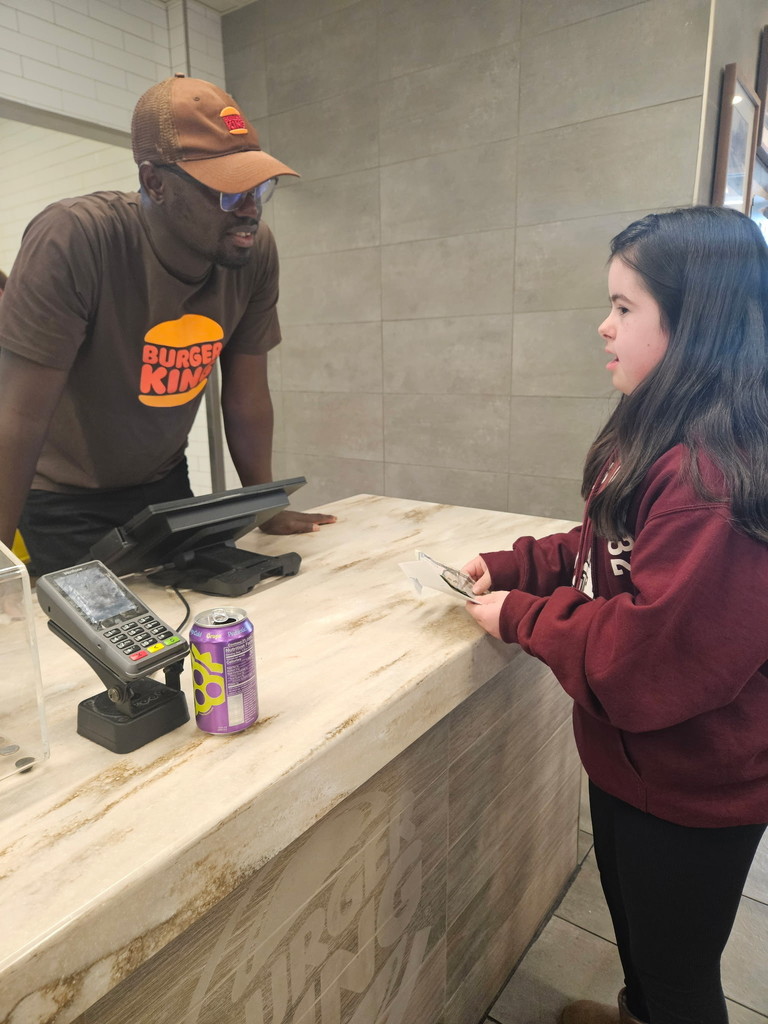 Image of middle school students  on CBI trip to Burger King.