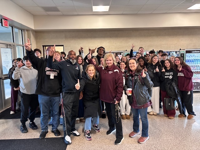students and staff leaving for the game