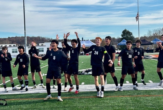 team celebrating on the field