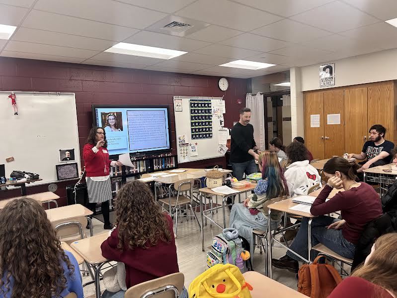 students watch Dr. Schmidt talk 