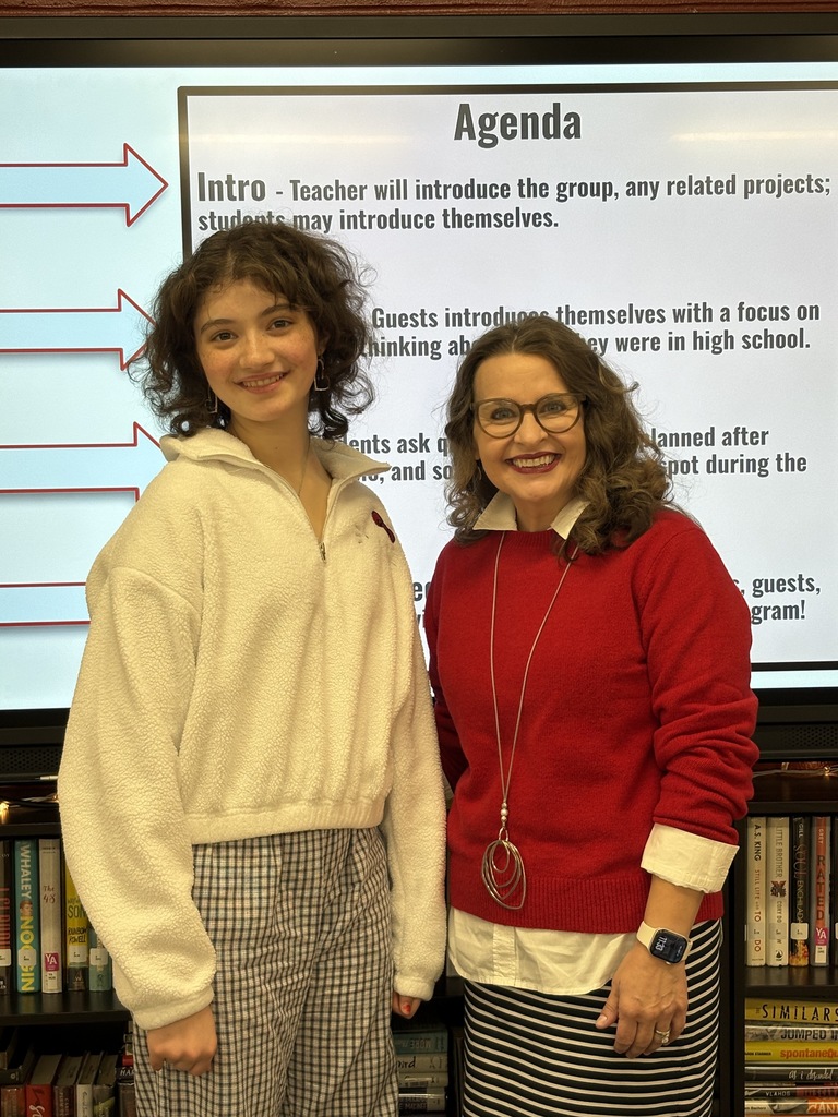 Madeline Krassner and Dr. Schmidt stand together