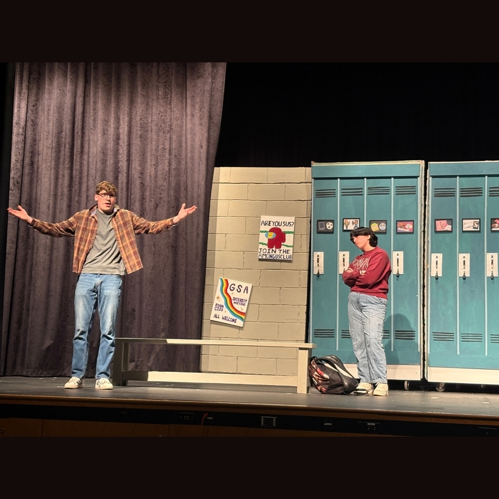 Pictures of students on stage in the school hallway set