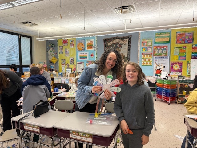 A student enjoying the event with their special quest.