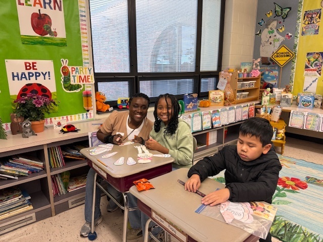 A student enjoying the event with their special quest.